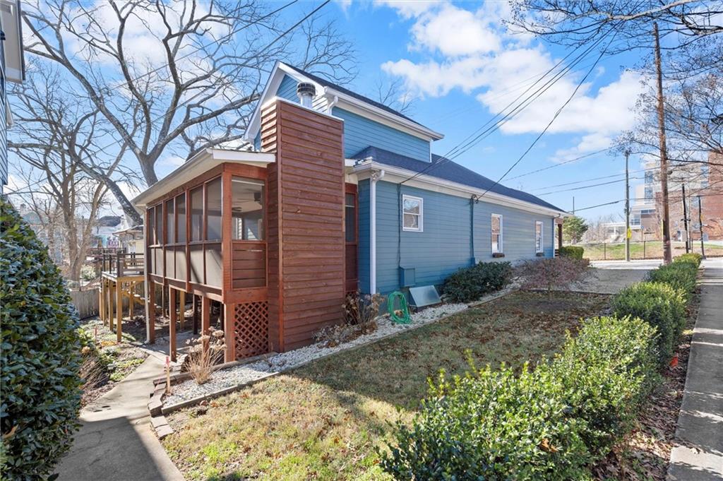 153 Randolph Street Northeast, Unit B Atlanta, GA 30312 - Photo 21 of 22 a view of a house with a yard