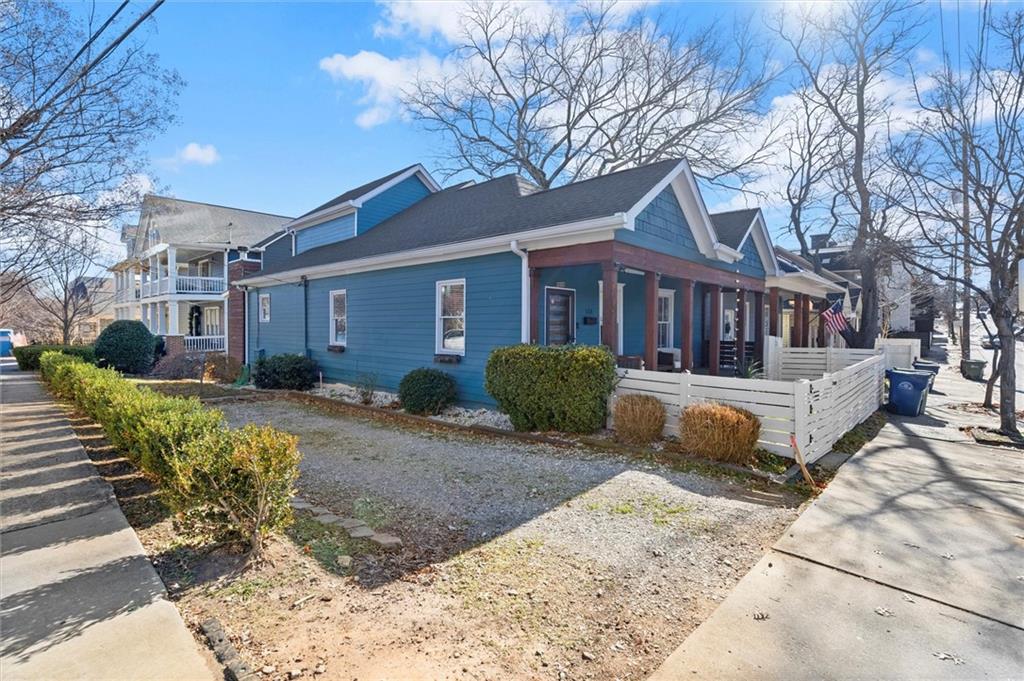153 Randolph Street Northeast, Unit B Atlanta, GA 30312 - Photo 22 of 22 a front view of a house with garden