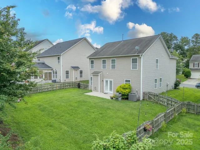 a house view with a garden space