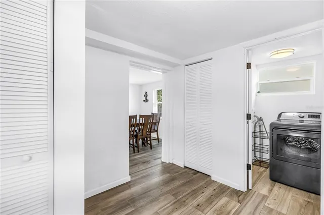 a view of a kitchen from the hallway