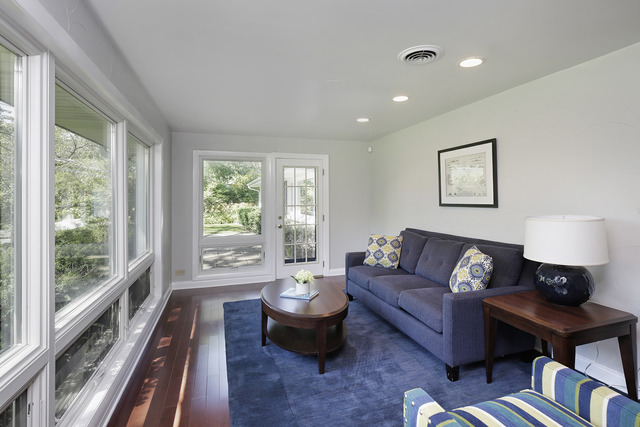 918 Lee Road Northbrook, IL 60062 - Photo 3 of 17 a living room with furniture and a large window