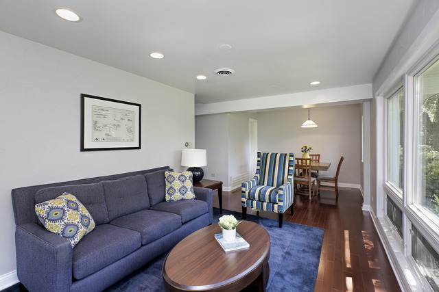 918 Lee Road Northbrook, IL 60062 - Photo 4 of 17 a living room with furniture and wooden floor