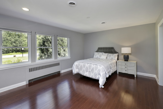 918 Lee Road Northbrook, IL 60062 - Photo 10 of 17 a bedroom with a bed and a large window