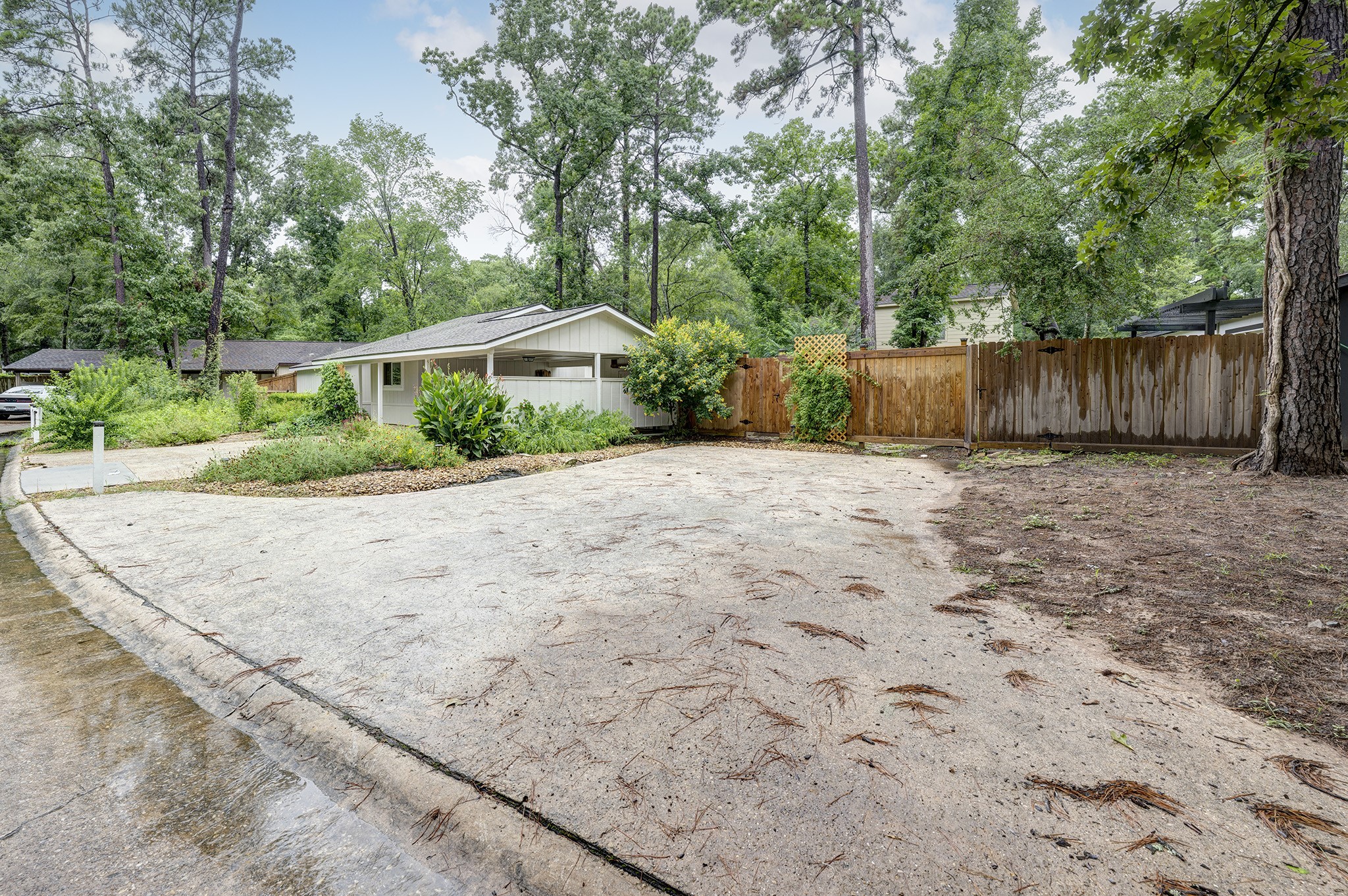 1911 North Red Cedar Circle Spring, TX 77380 - Photo 14 of 14 a backyard of a house with lots of green space