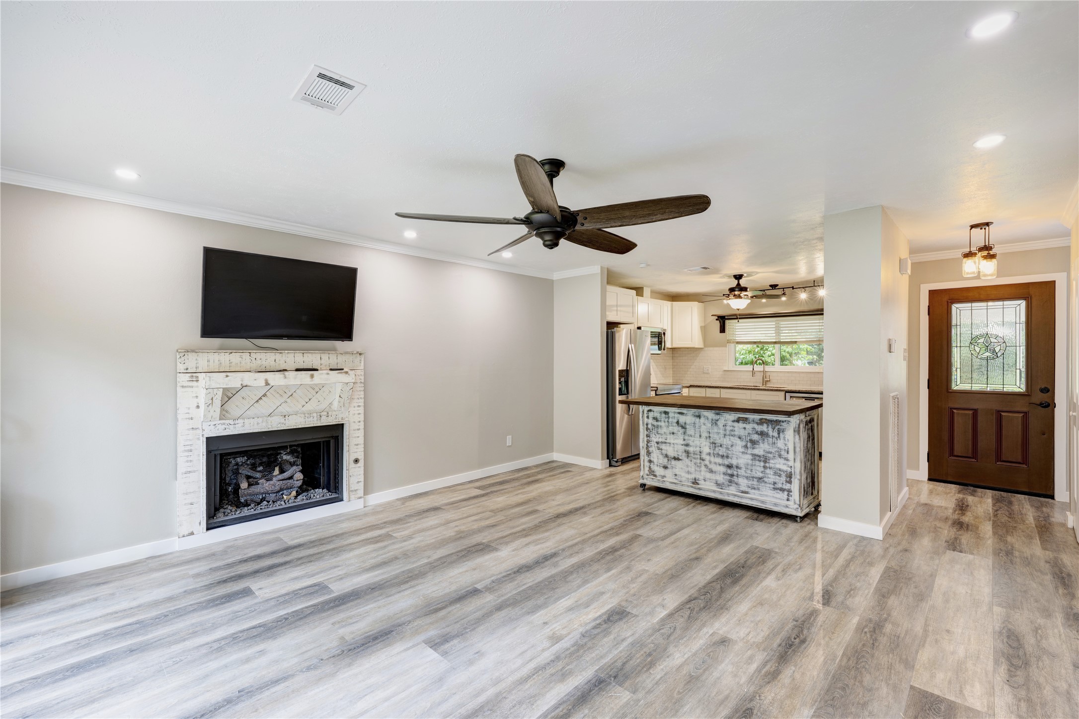 1911 North Red Cedar Circle Spring, TX 77380 - Photo 3 of 14 a living room with furniture and a fireplace