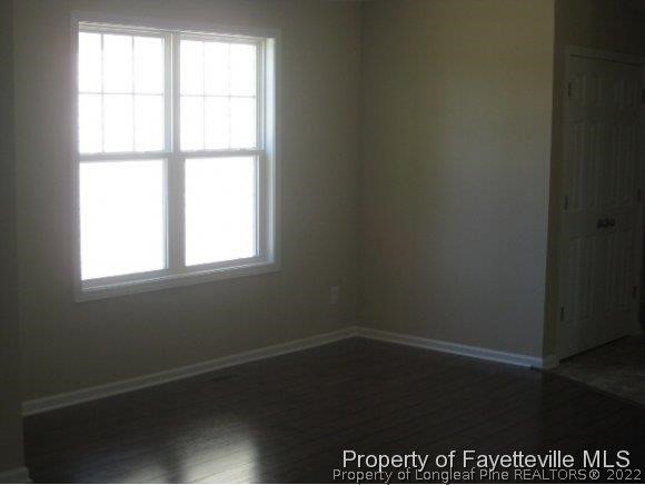 89 Jamestown Drive Spring Lake, NC 28390 - Photo 2 of 13 an empty room with a window