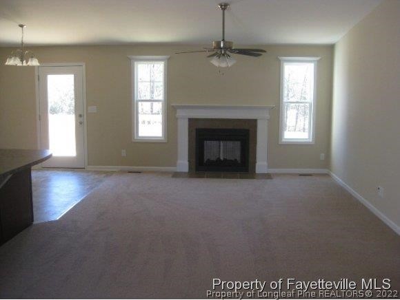 89 Jamestown Drive Spring Lake, NC 28390 - Photo 3 of 13 a view of empty room with a fireplace