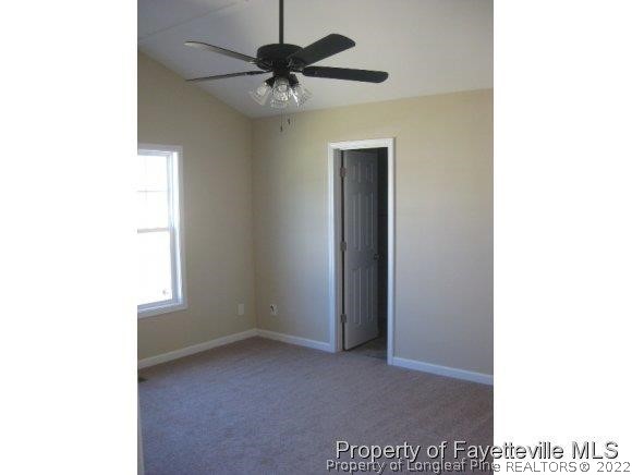 89 Jamestown Drive Spring Lake, NC 28390 - Photo 9 of 13 a view of an empty room with a window