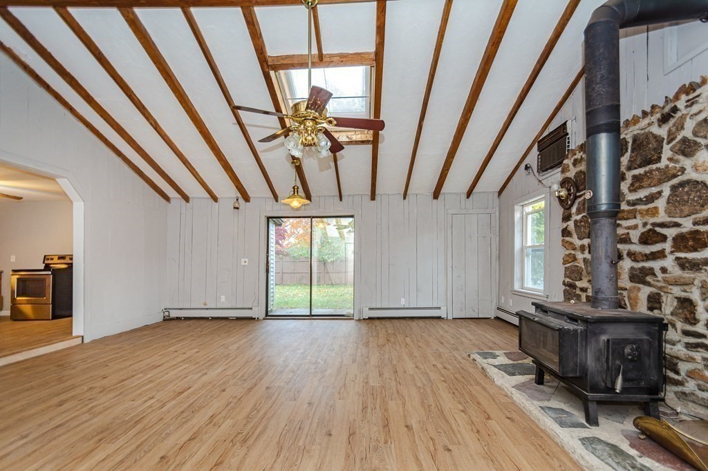 35 Bernadette Street Fitchburg, MA 01420 - Photo 11 of 19 a view of an empty room with wooden floor and a window