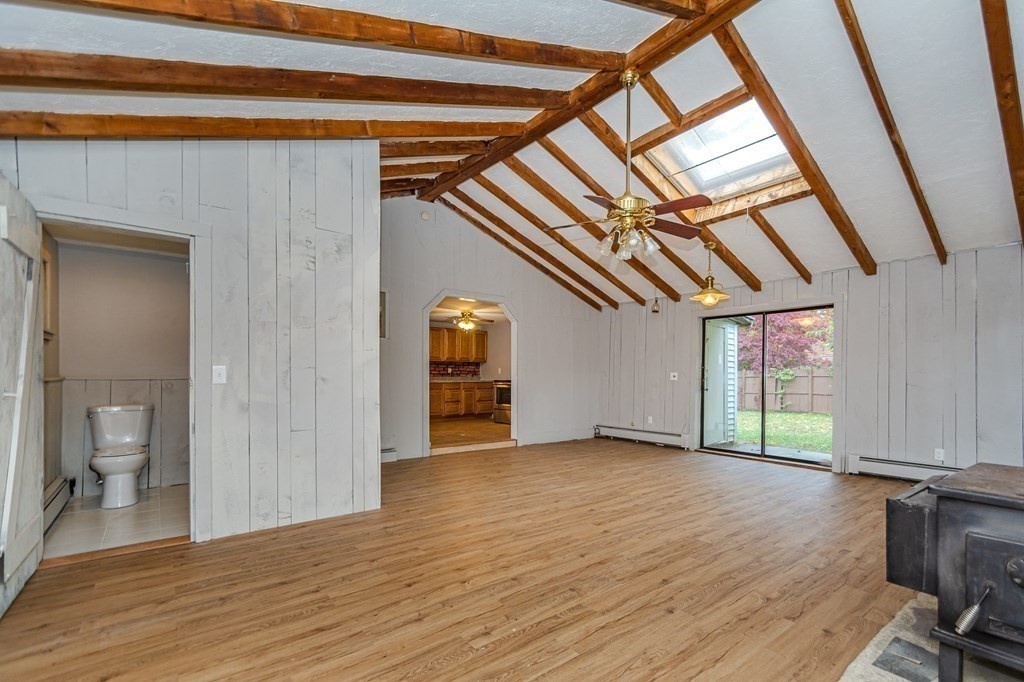 35 Bernadette Street Fitchburg, MA 01420 - Photo 13 of 19 a view of empty room with wooden floor and fan