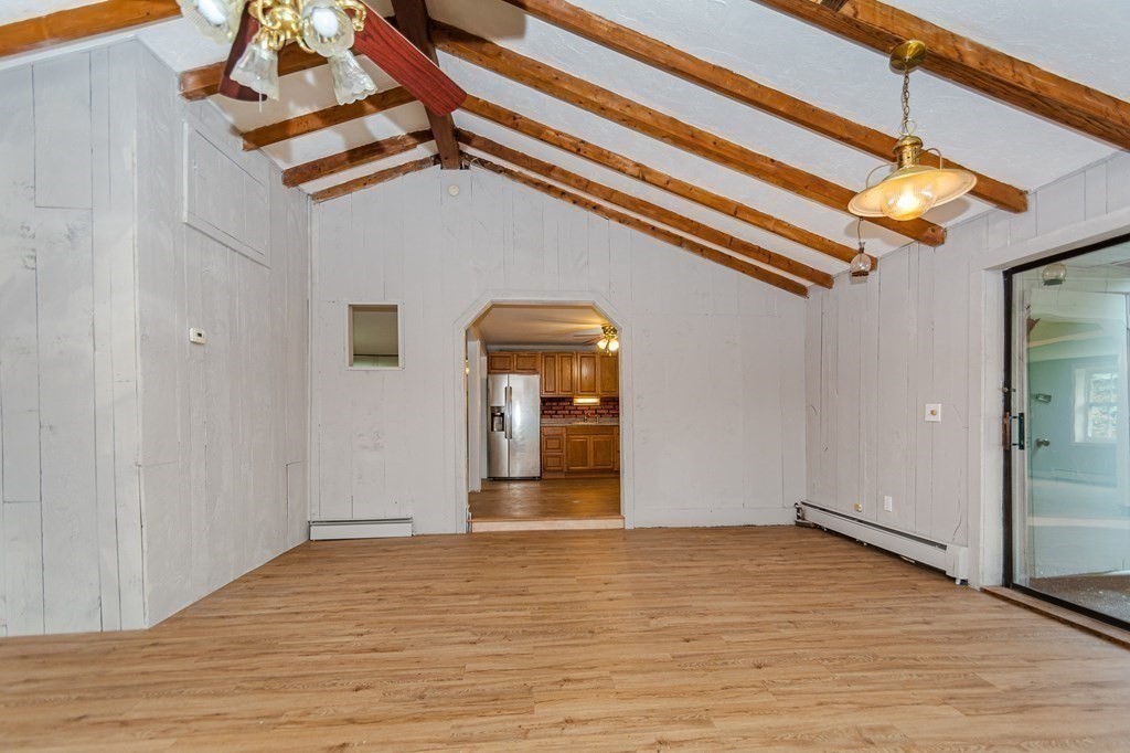 35 Bernadette Street Fitchburg, MA 01420 - Photo 14 of 19 a view of a room with wooden floor and stairs