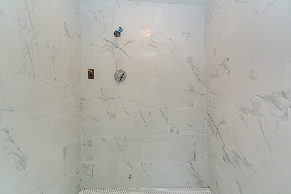 35 Bernadette Street Fitchburg, MA 01420 - Photo 17 of 19 a bathroom with a shower