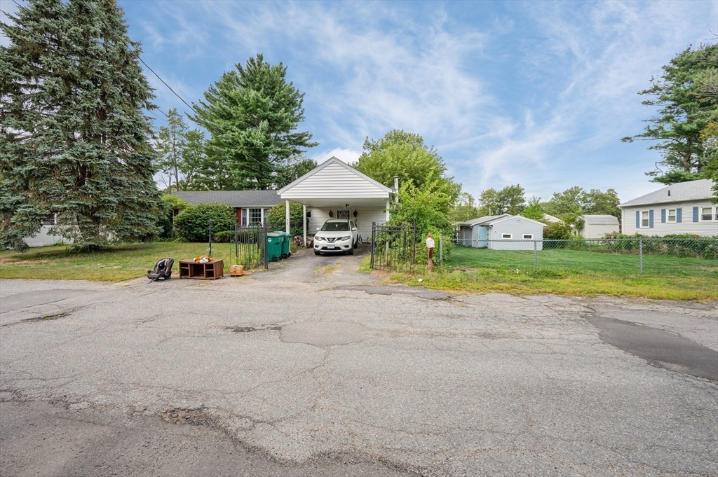 35 Bernadette Street Fitchburg, MA 01420 - Photo 19 of 19 a view of backyard with swimming pool and green space