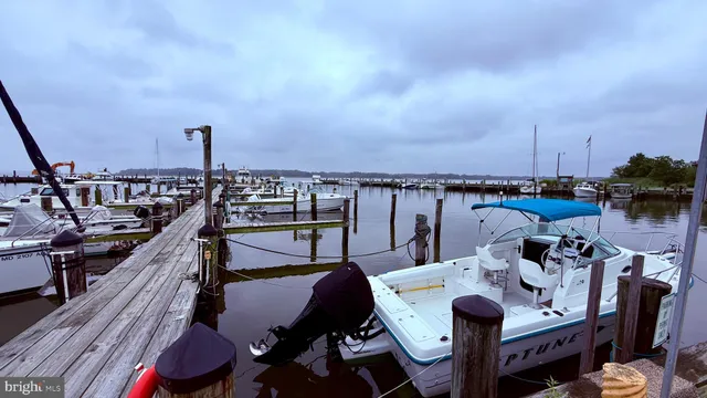 a view of a balcony with chairs