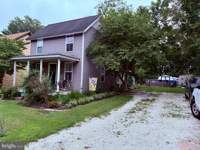 a view of a house with a garden