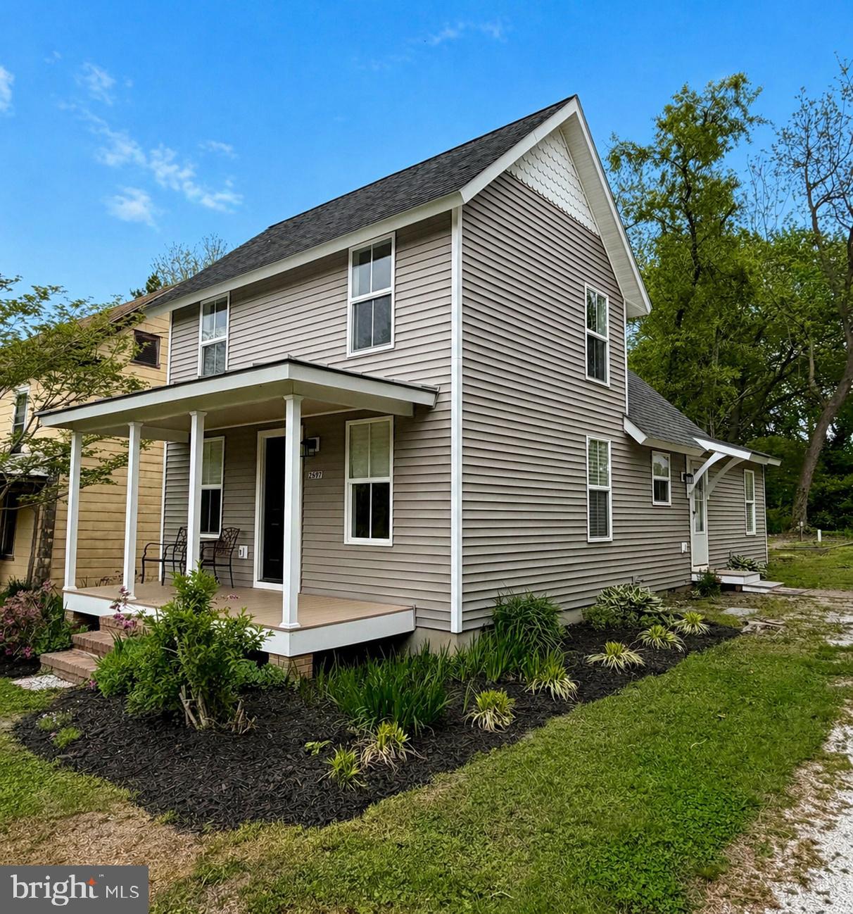 2697 Choptank Main Street Preston, MD 21655 - Photo 2 of 37 a front view of a house with garden