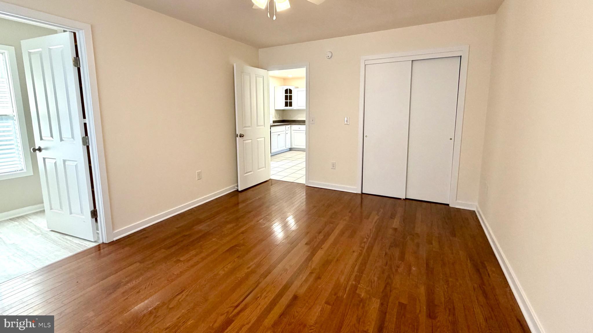 2697 Choptank Main Street Preston, MD 21655 - Photo 23 of 37 an empty room with wooden floor and windows