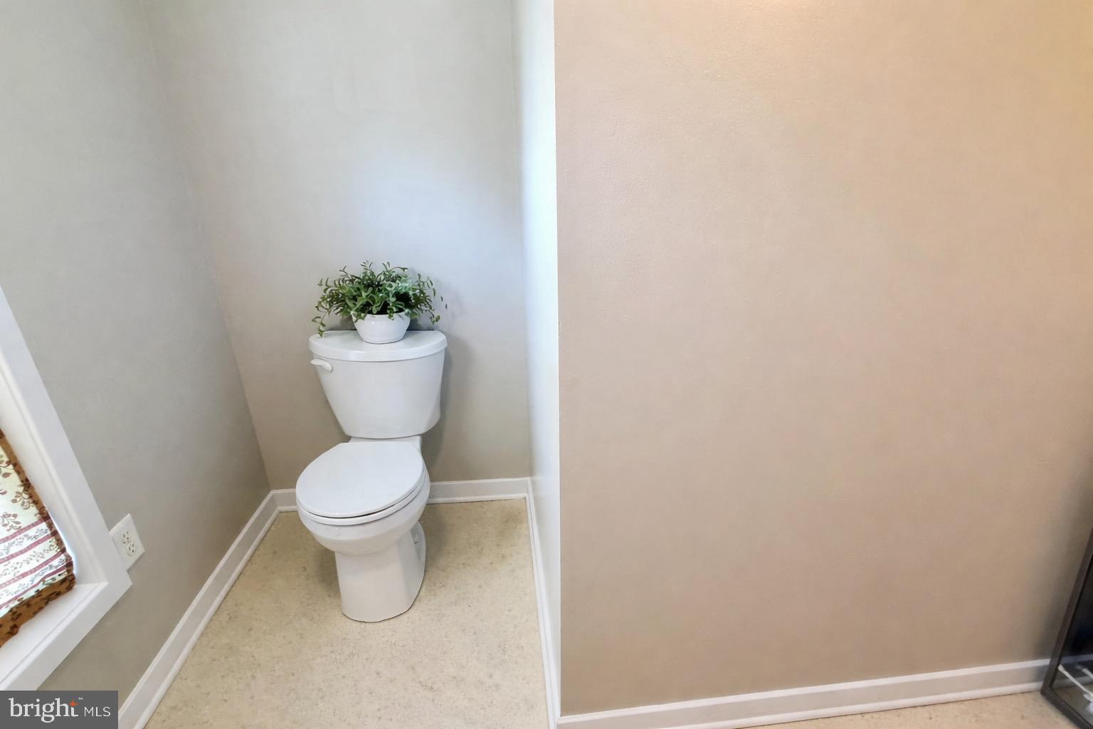 2697 Choptank Main Street Preston, MD 21655 - Photo 29 of 37 a white toilet sitting next to a shower