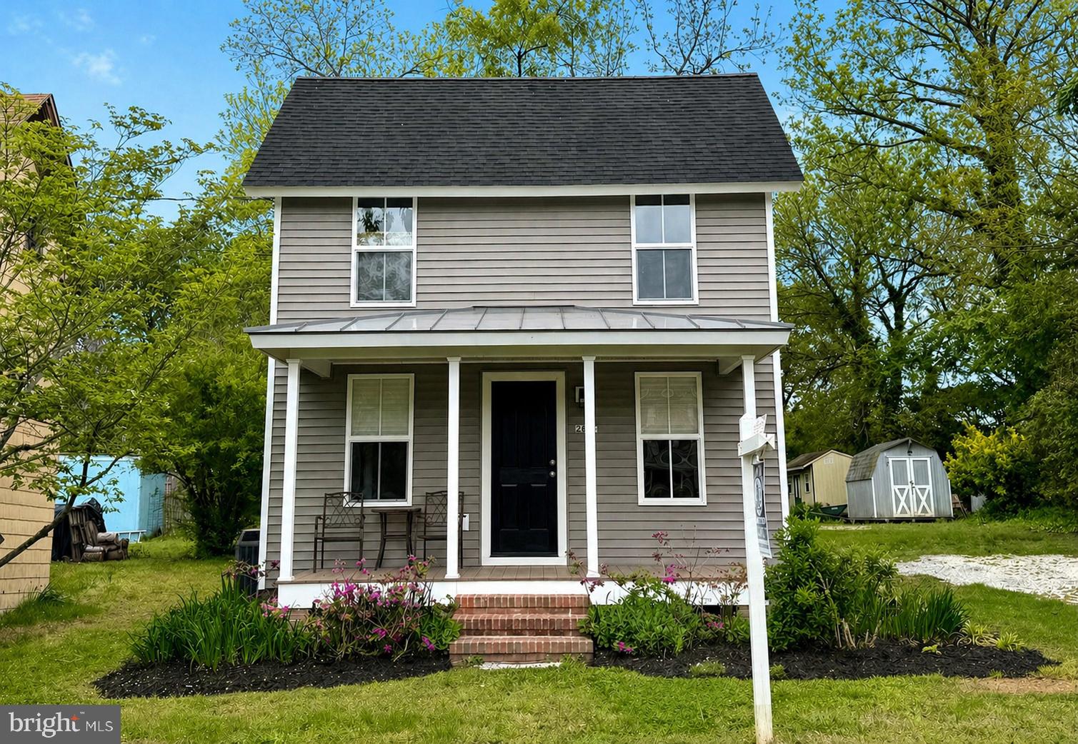 2697 Choptank Main Street Preston, MD 21655 - Photo 4 of 37 a front view of a house with a yard