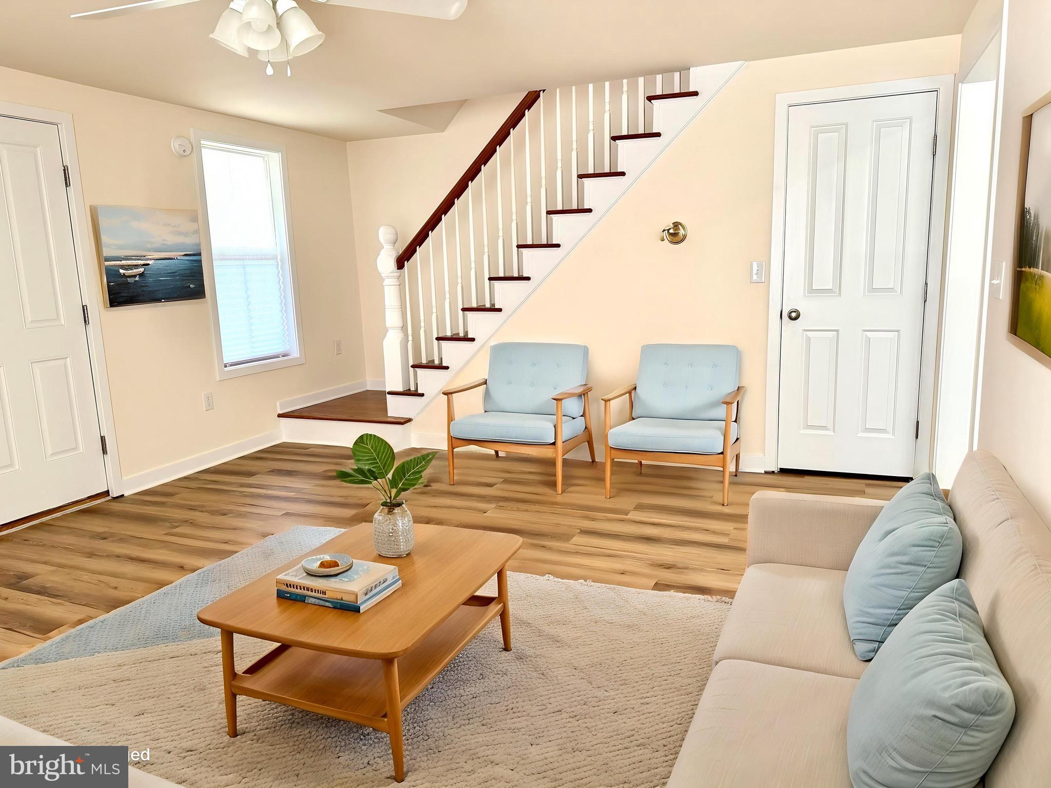 2697 Choptank Main Street Preston, MD 21655 - Photo 9 of 37 a view of a livingroom with furniture and stairs