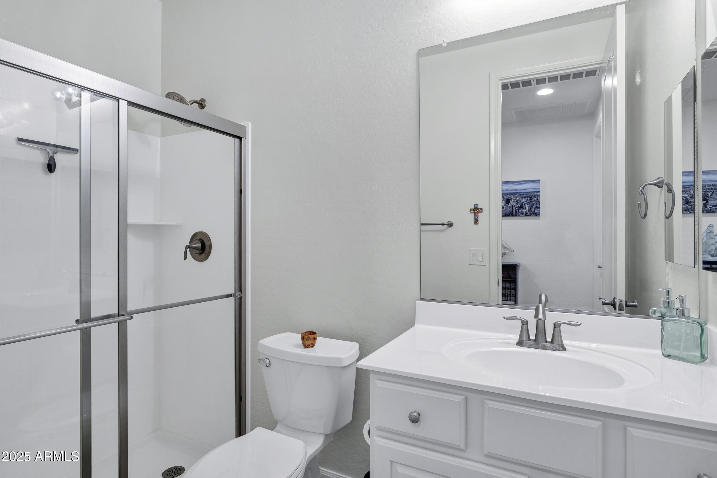 4410 South Intensity Mesa, AZ 85212 - Photo 18 of 28 a bathroom with a sink a toilet and shower