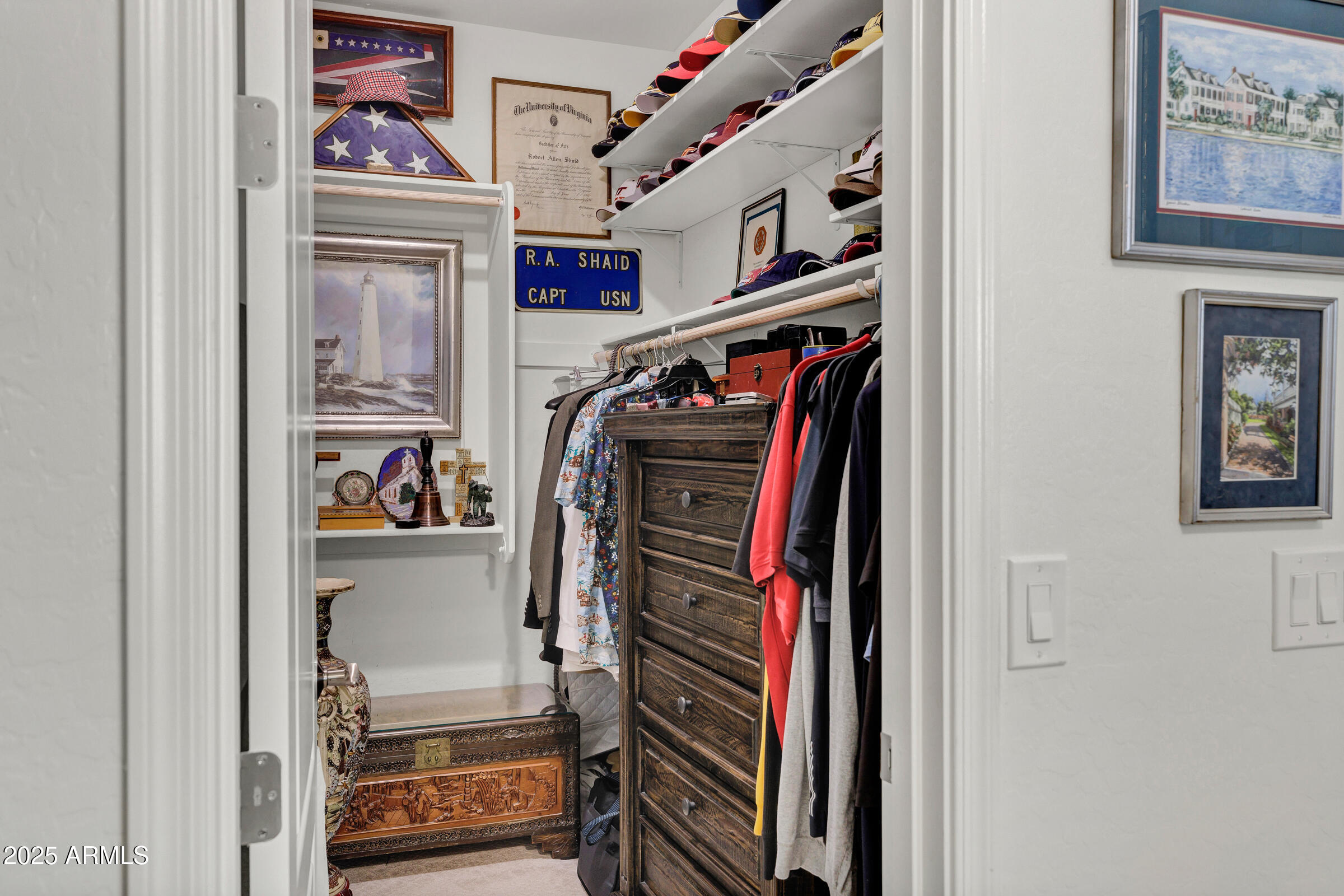 4410 South Intensity Mesa, AZ 85212 - Photo 20 of 28 a view of walk in closet with clothes and shoes