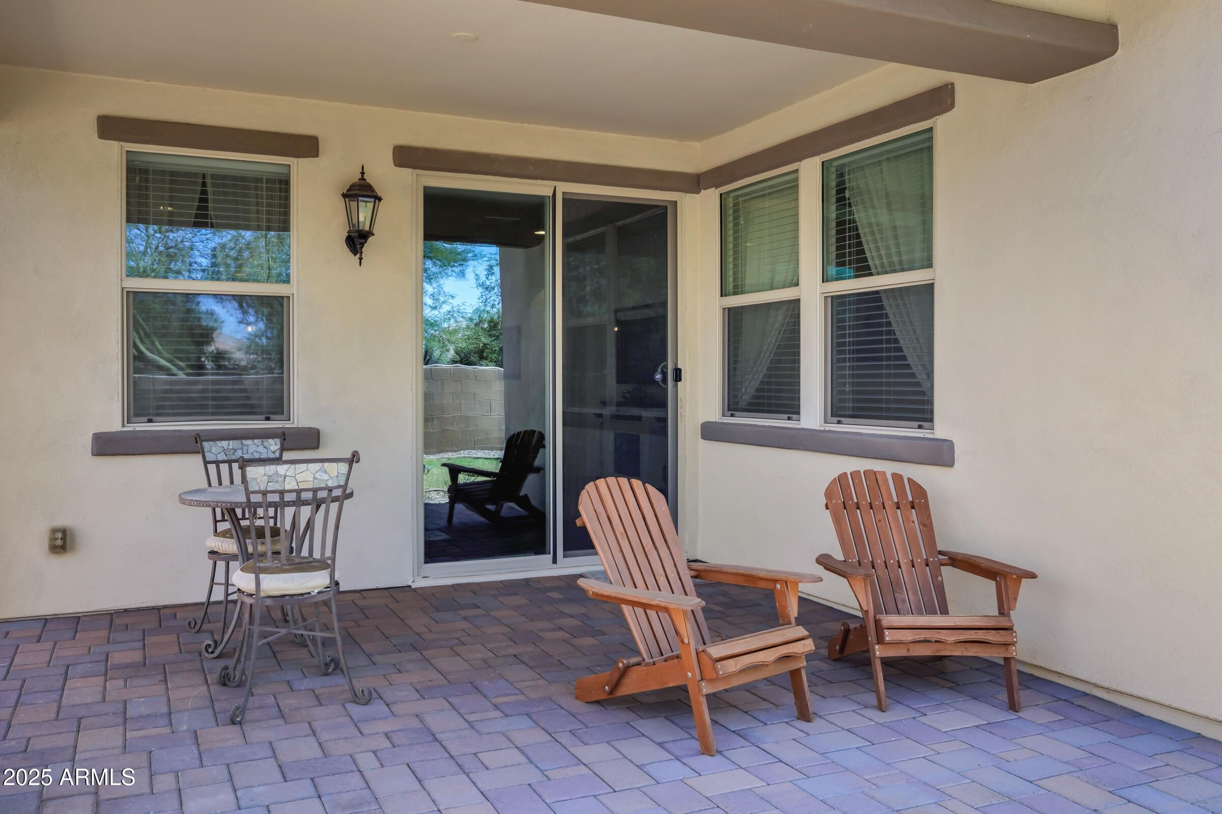 4410 South Intensity Mesa, AZ 85212 - Photo 28 of 28 a chair and a table in a room