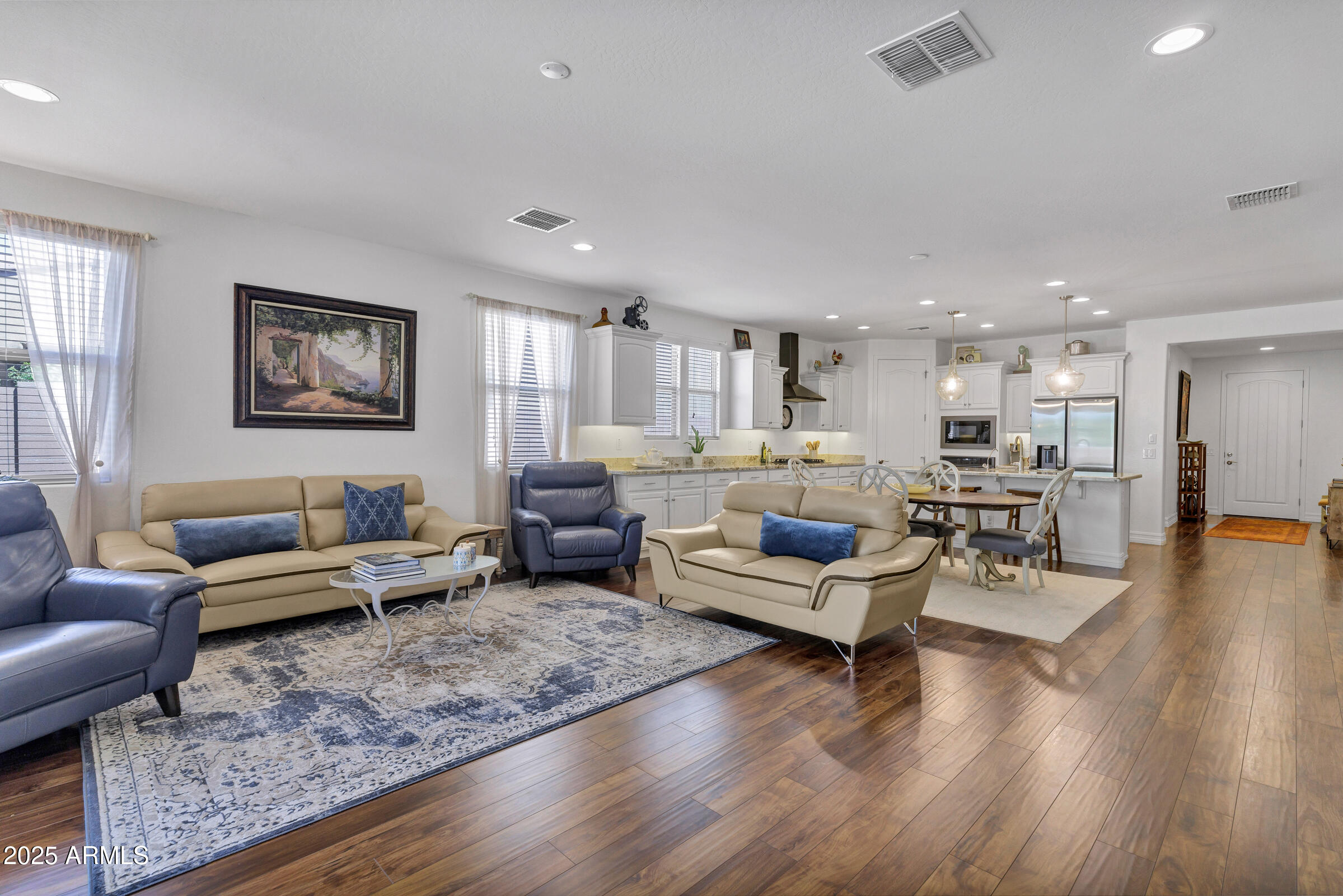 4410 South Intensity Mesa, AZ 85212 - Photo 6 of 28 a living room with furniture and wooden floor