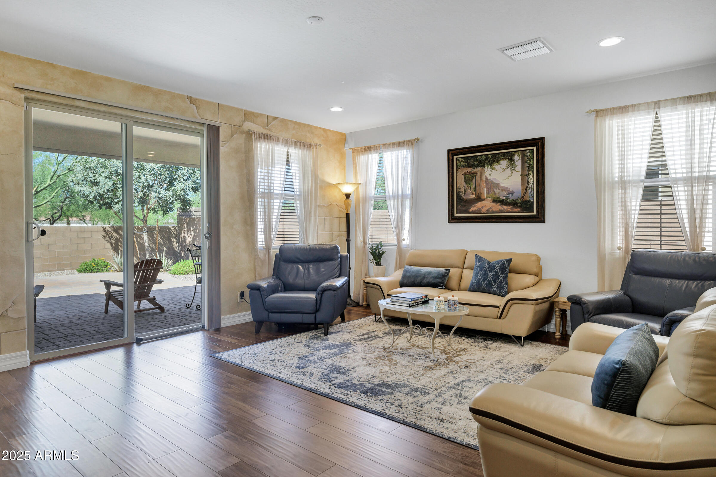 4410 South Intensity Mesa, AZ 85212 - Photo 7 of 28 a living room with furniture and a large window