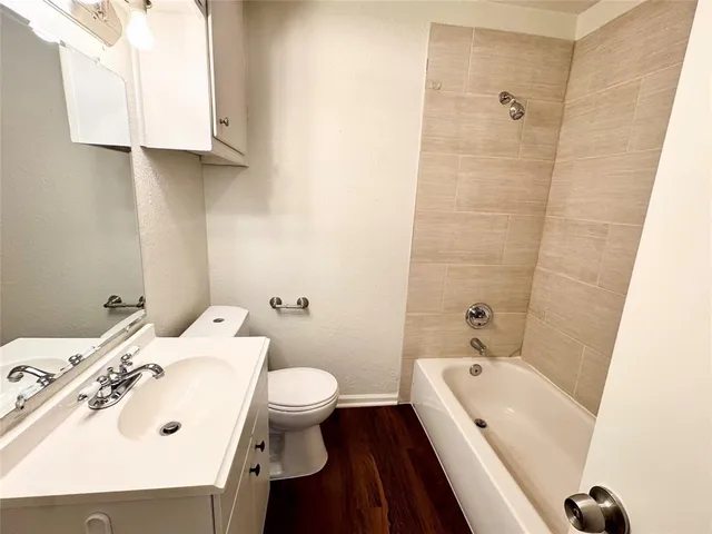 a bathroom with a sink and a bathtub