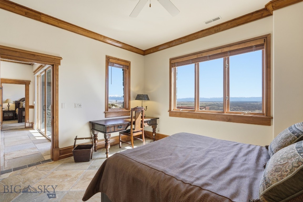 1240 Twin River Cutoff Road Manhattan, MT 59741 - Photo 53 of 88 Lower-level bedroom with sitting area, and ensuite