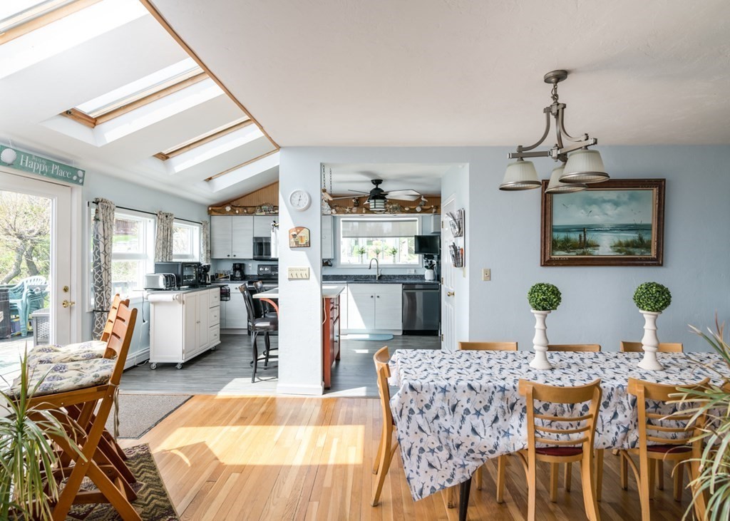 262 Manomet Point Road Plymouth, MA 02360 - Photo 12 of 40 a living room with furniture and wooden floor