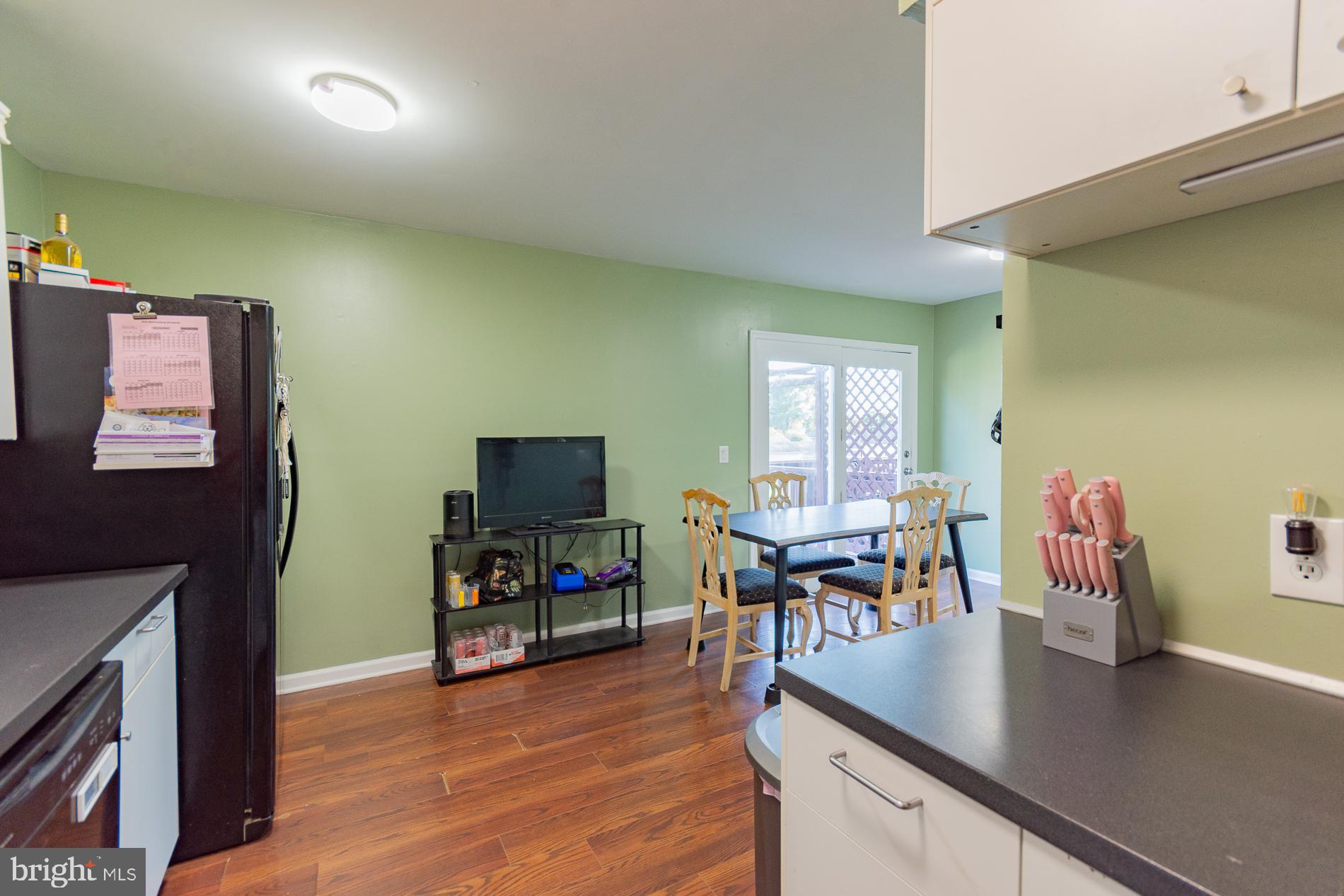 306 East 12th Avenue, Unit B Ranson, WV 25438 - Photo 12 of 31 a living room with furniture and a flat screen tv