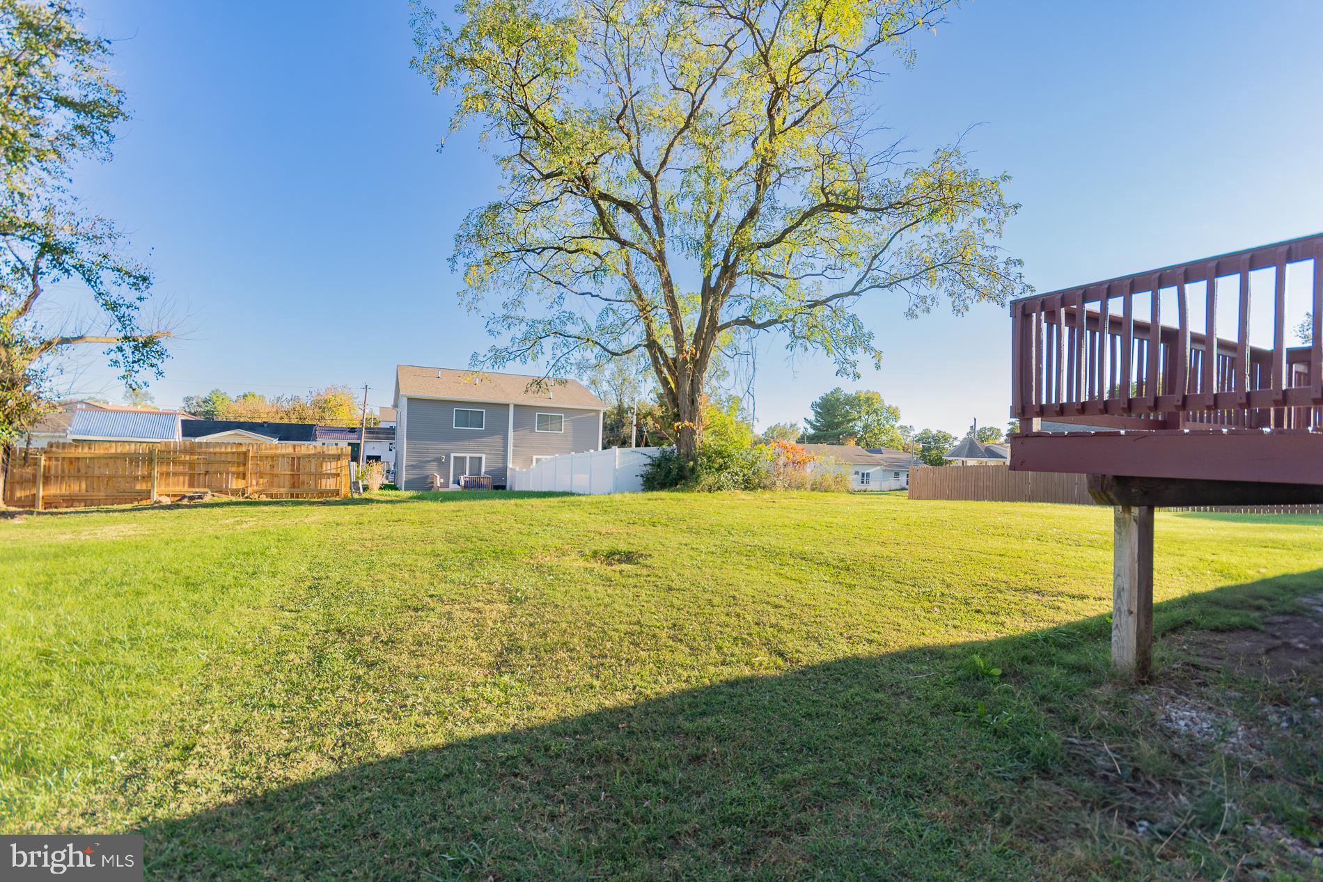 306 East 12th Avenue, Unit B Ranson, WV 25438 - Photo 24 of 31 a view of a house with a yard