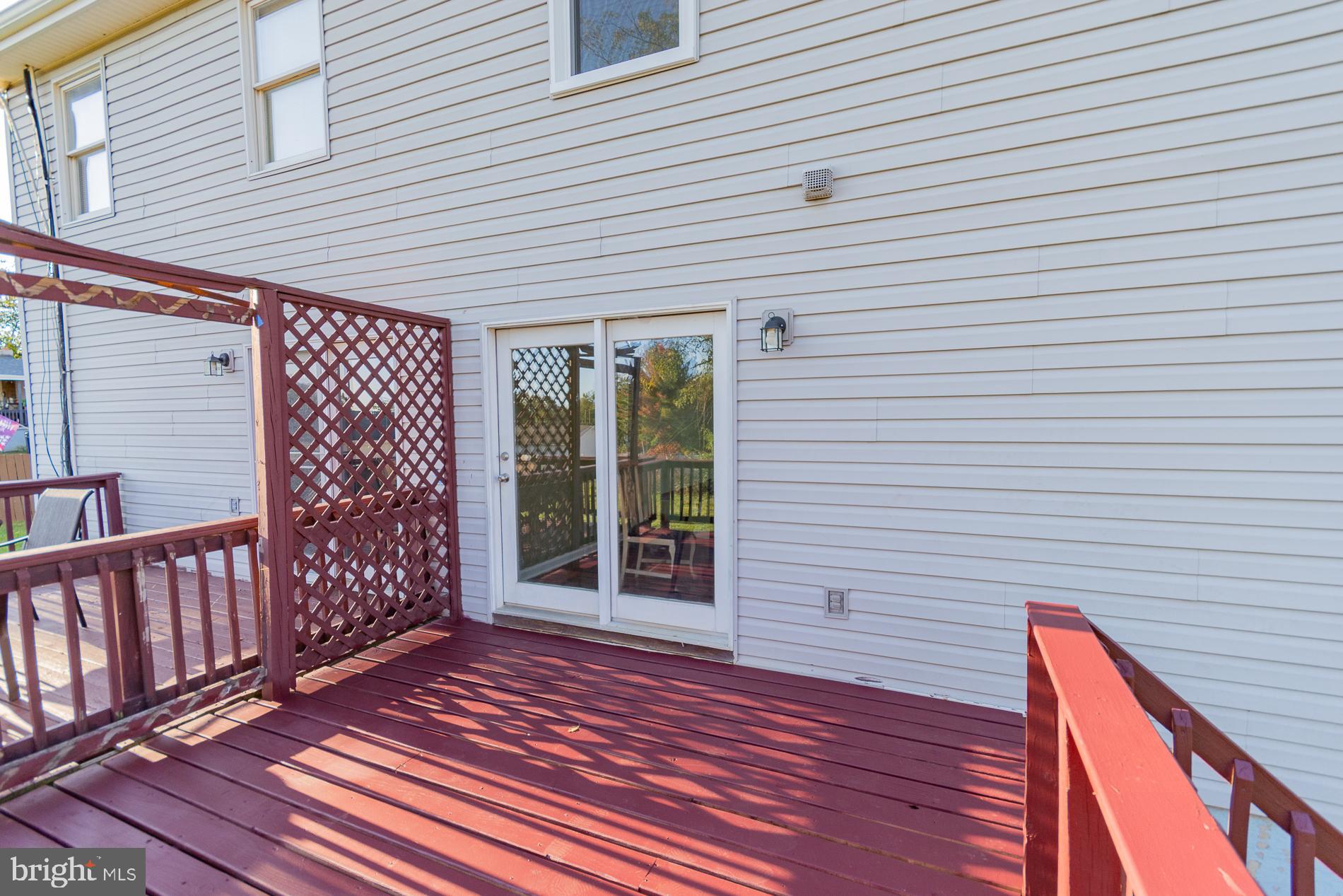 306 East 12th Avenue, Unit B Ranson, WV 25438 - Photo 28 of 31 a view of a house with wooden deck