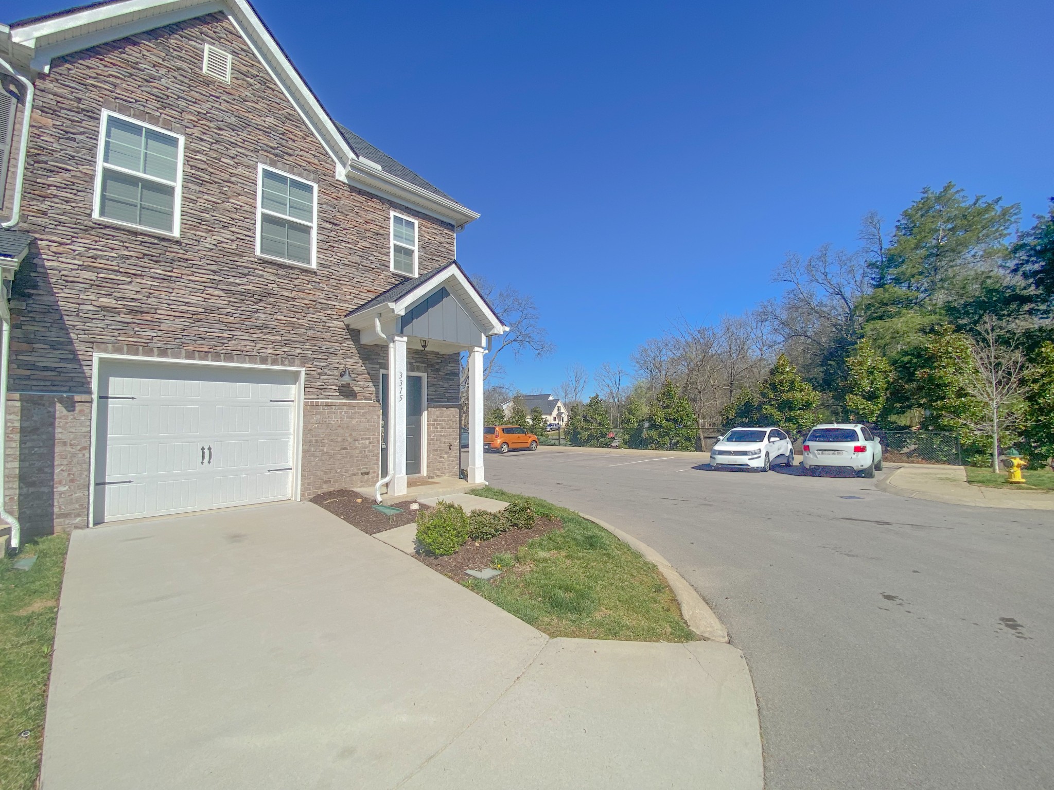3315 Deerchase Circle Murfreesboro, TN 37129 - Photo 26 of 37 a front view of a house with a yard and garage