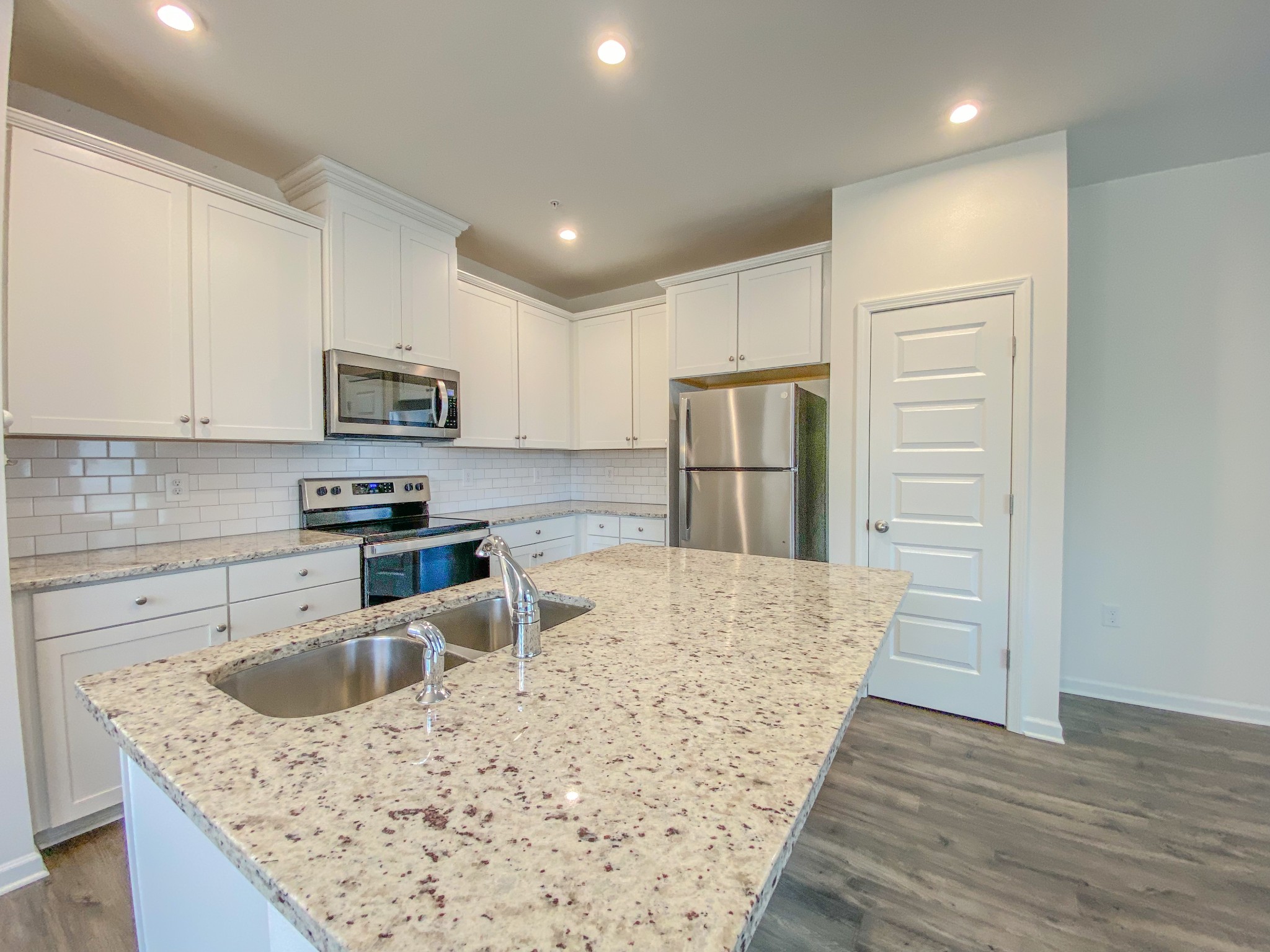 3315 Deerchase Circle Murfreesboro, TN 37129 - Photo 4 of 37 a kitchen with a refrigerator sink and cabinets