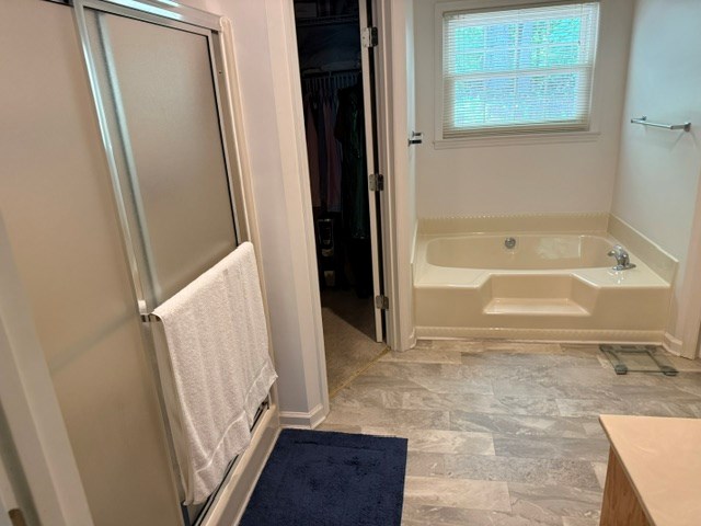 2948 Hendriske Road Young Harris, GA 30582 - Photo 17 of 20 a bathroom with a tub shower and a sink