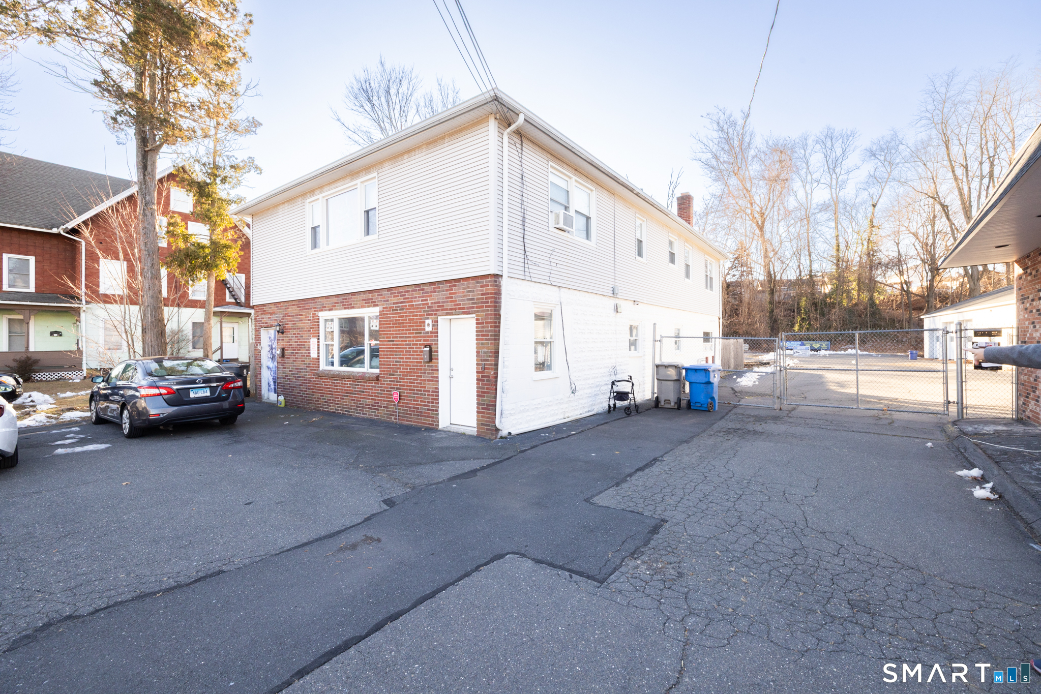 159 Park Street Bristol, CT 06010 - Photo 1 of 39 a view of a street with a building