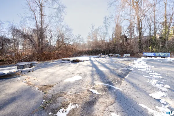 an aerial view of residential houses and outdoor space