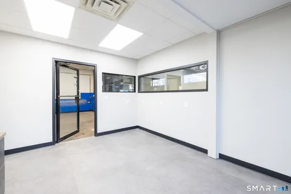 a view of cabinets and window