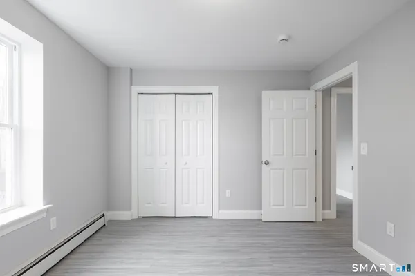 a view of an empty room and window