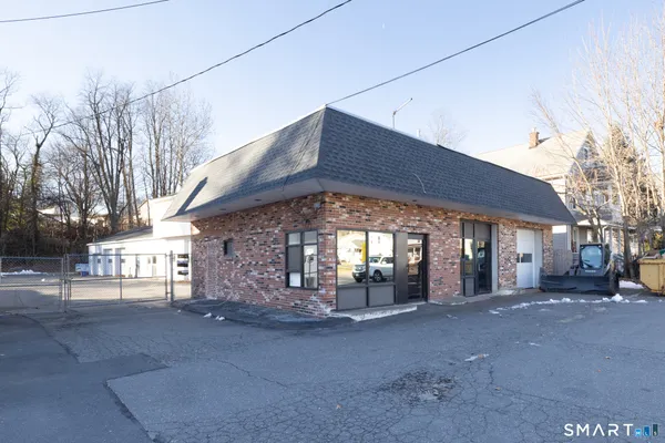 a view of a building with a street