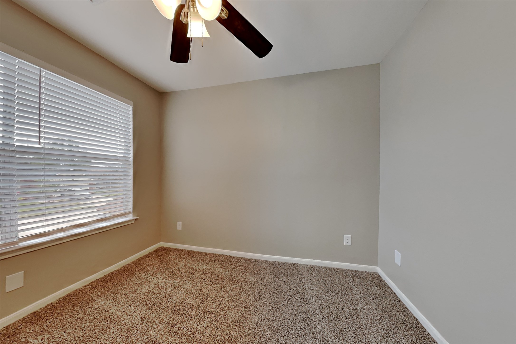 11802 Rolling Stream Drive Tomball, TX 77375 - Photo 12 of 19 a view of an empty room with a window