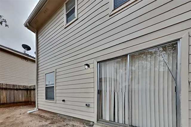 a view of a back yard of the house