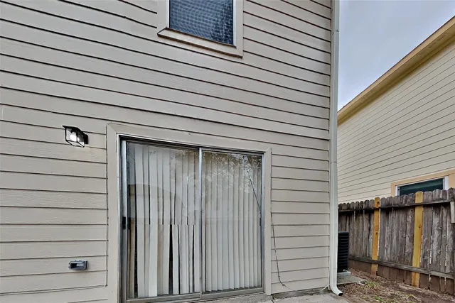 a picture of a book and a white bed