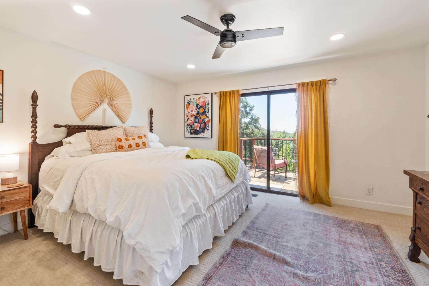 1228 Wingdam Road Murphys, CA 95247 - Photo 17 of 43 a bed sitting in a spacious bedroom next to a window