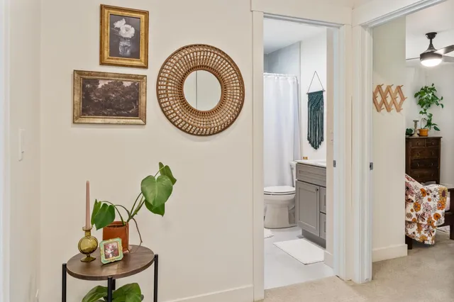 a bedroom with bed and a window