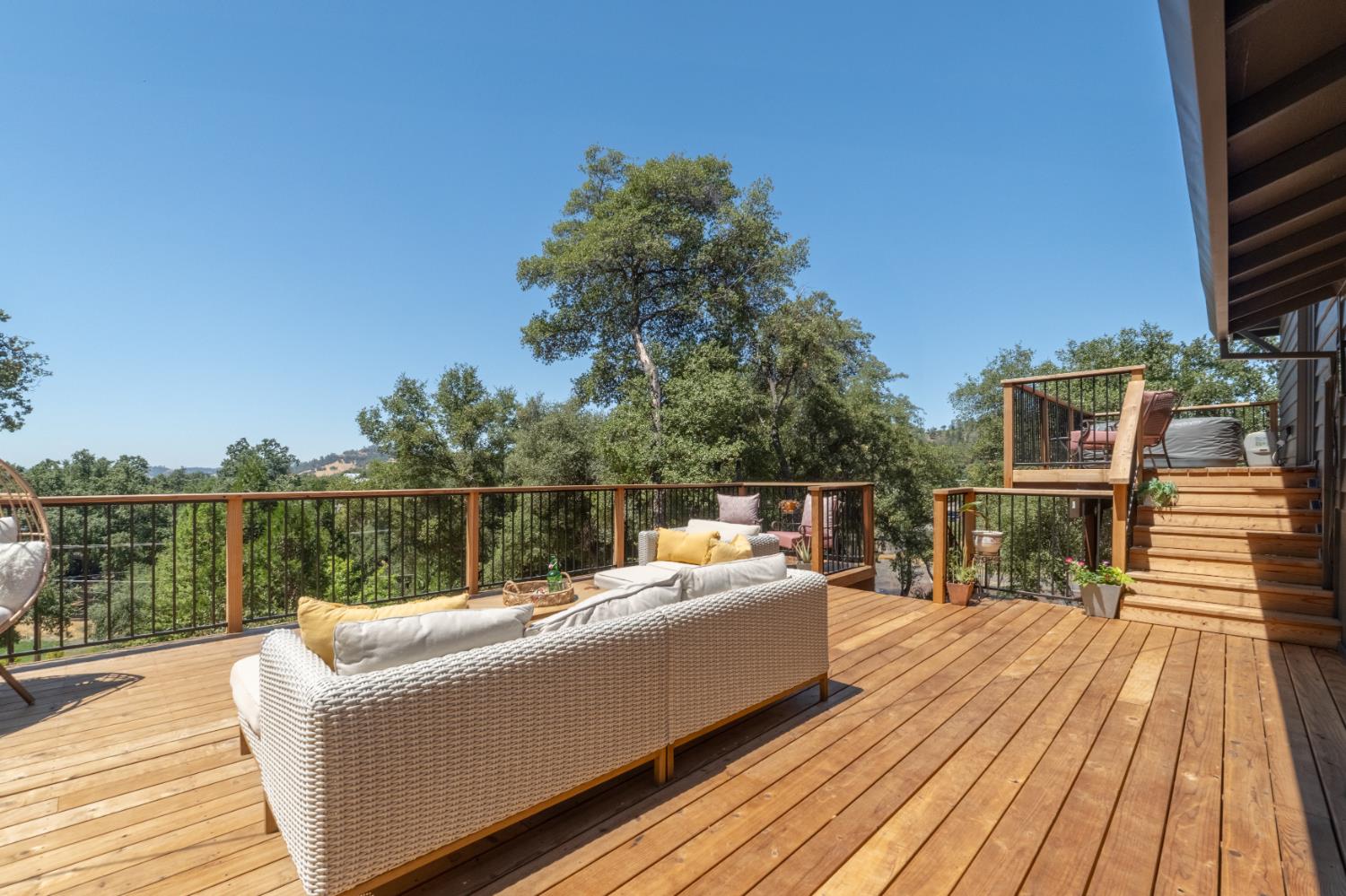 1228 Wingdam Road Murphys, CA 95247 - Photo 32 of 43 a balcony with wooden floor and outdoor seating