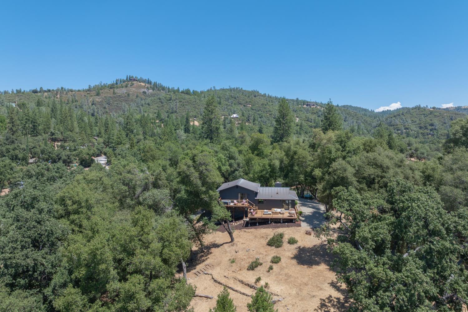 1228 Wingdam Road Murphys, CA 95247 - Photo 37 of 43 a view of a mountain with a outdoor space